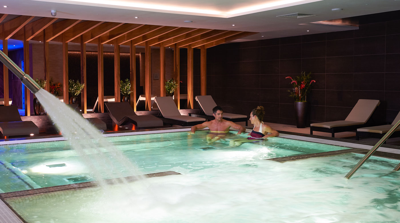 Image of people relaxing in the spa at David Lloyd Cambridge
