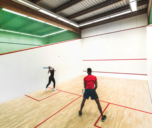 Image of players on squash court